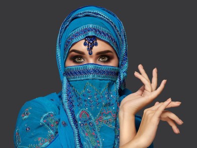 Prostitution-in-the-Arab-World-cover A Middle Eastern woman looking seductively, representing prostitution in the Arab world.