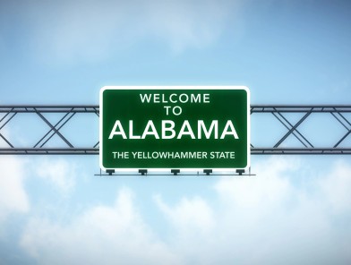 Welcome to Alabama sign representing the state’s new tax targeting adult websites.