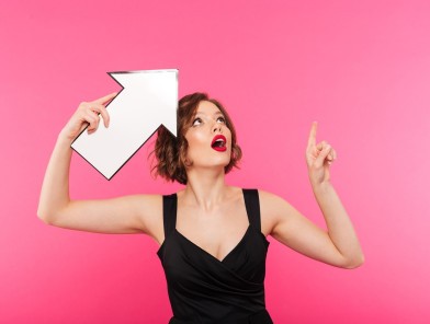 Escort promoting profile online to boost visibility and SEO on Escort-Ads.com